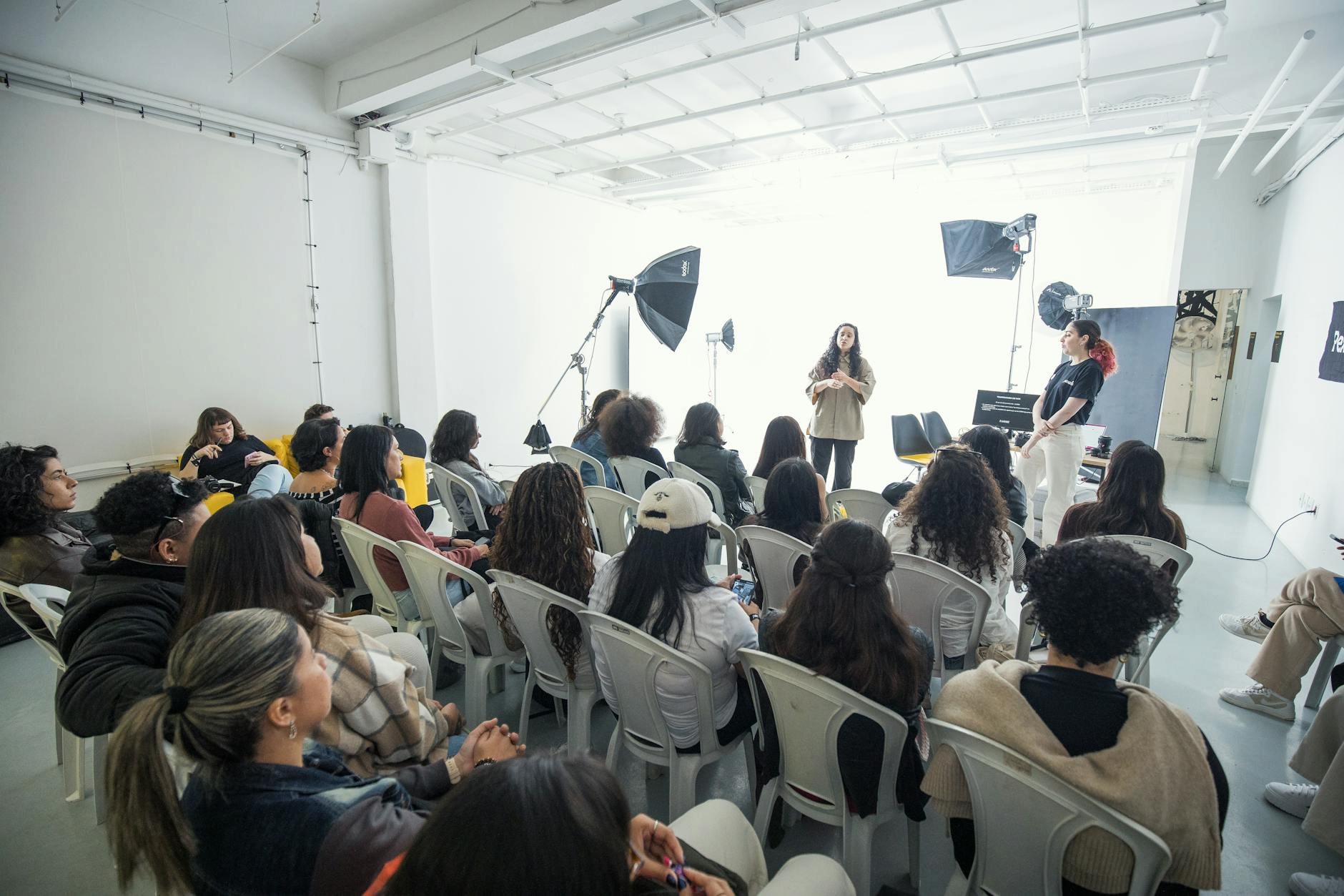 Student group workshop with facilitator and participants engaged in discussion